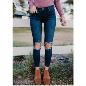 free people dark wash busted knee jeans